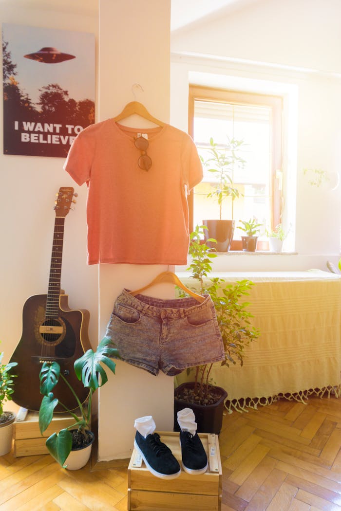 services-02 Warm and inviting living space featuring casual wear, guitar, and indoor plants.